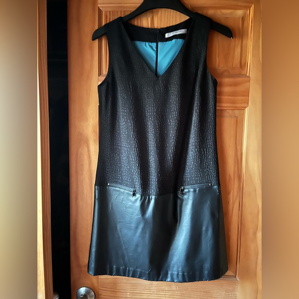 Detail Galore Andrew Marc rock n roll dress.